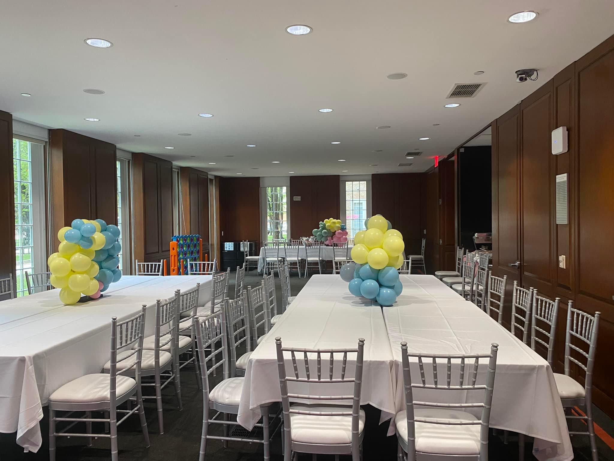 Long tables with white linens