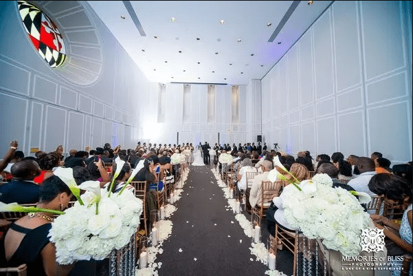 White flower lining an aisle
