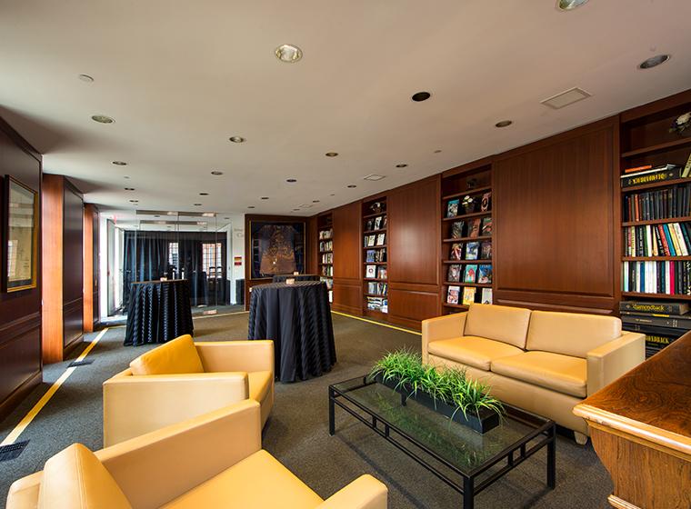 Library set with couches and arm chairs and hightop tables