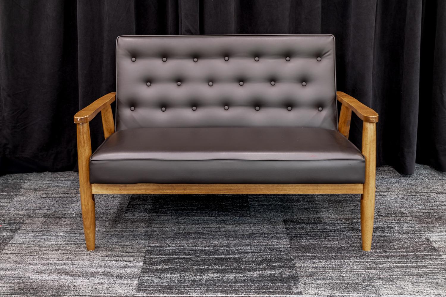 Black Leather Chair with Wooden armrests and legs. 